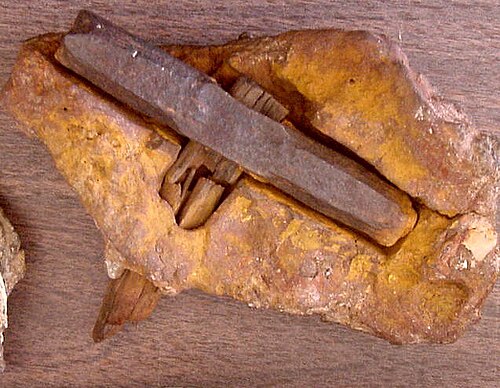 The so-called London Hammer, an iron hammerhead embedded in a rock concretion, found near London, Texas
